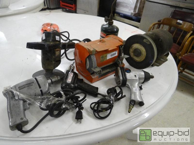 lot 780 image: 2 bench grinders, drill, buffer, torch, solde...
