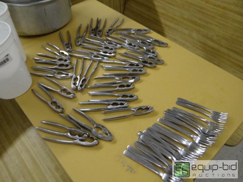 lot 786 image: Lot of 34 crab crackers and 26 shrimp forks....