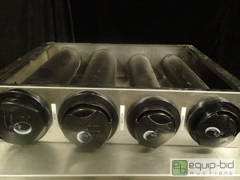 lot 1143 image: Four Size Lid Dispenser