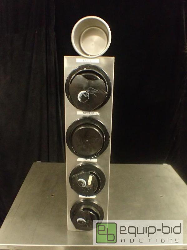 lot 1144 image: Four Size Lid Dispenser