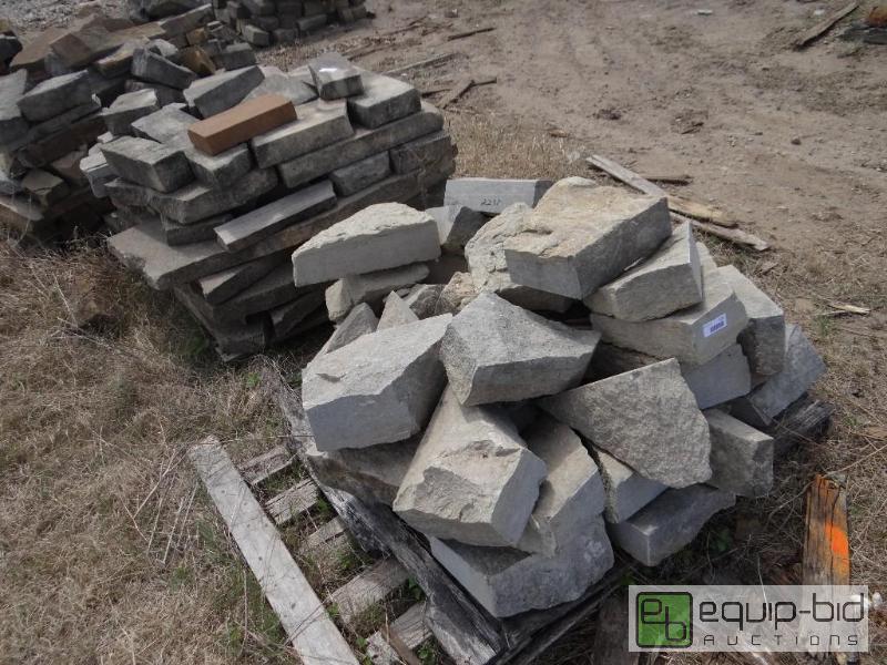 lot 2215 image: 3 Pallets of various size landscaping rock.  ...