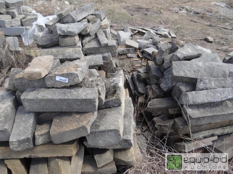 lot 2217 image: 5 Pallets of various size landscaping rock.  ...