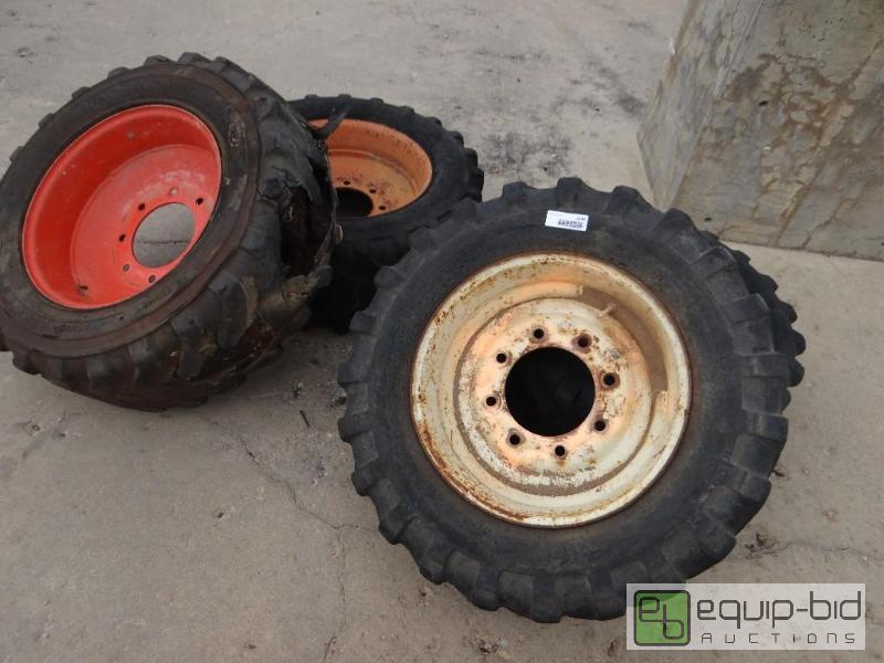 lot 2244 image: Set of 4 skid loader tireswheels....