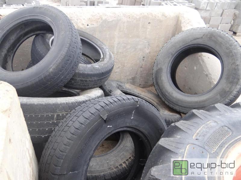 lot 2245 image: Large lot of used tires in various unknown co...