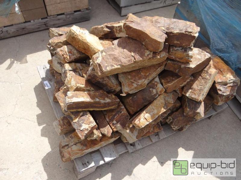 lot 2323 image: Pallet of landscape rock.  Skid loader and ...