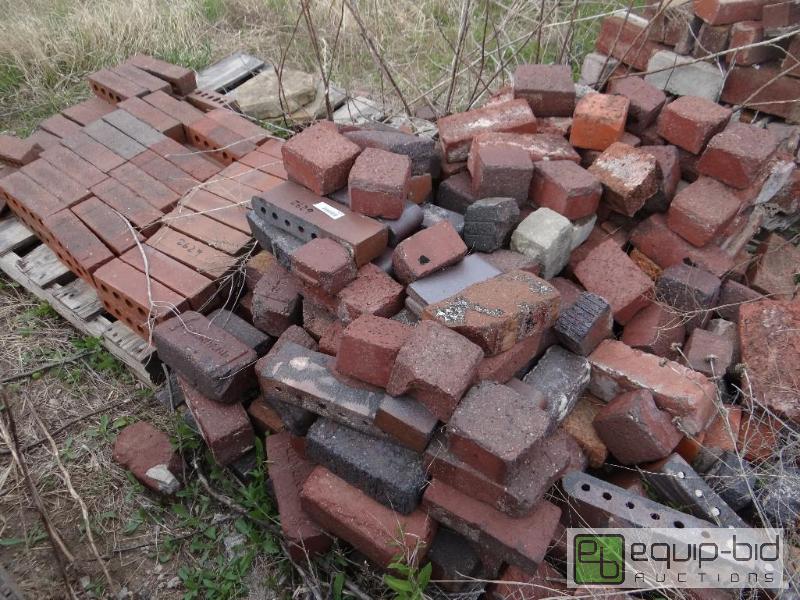 lot 2629 image: 3 piles of brickbuilding block.  Skid load...