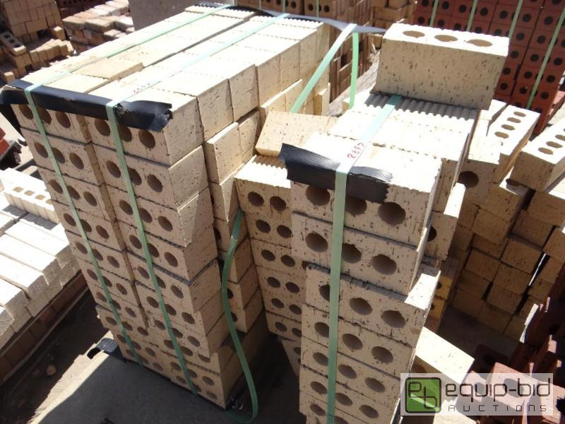 lot 2697 image: Bundle of brickbuilding block.  Skid loade...