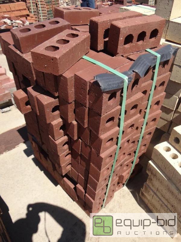 lot 2698 image: Bundle of brickbuilding block.  Skid loade...