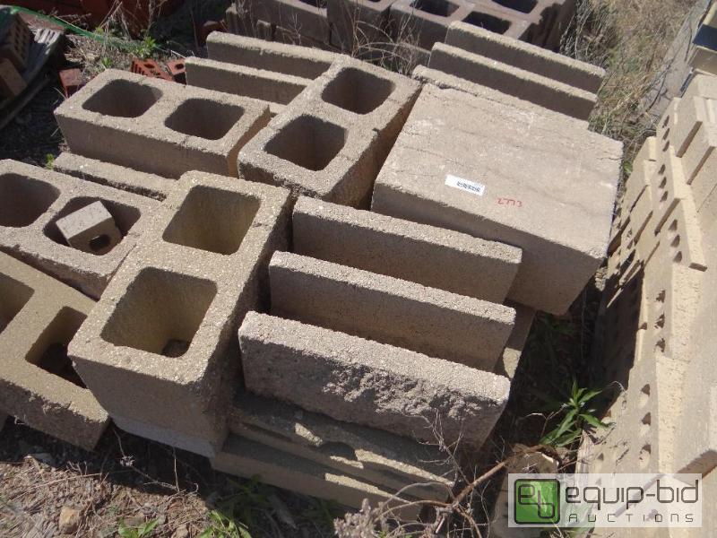 lot 2773 image: 2 Pallet of building block.  Skid loader an...