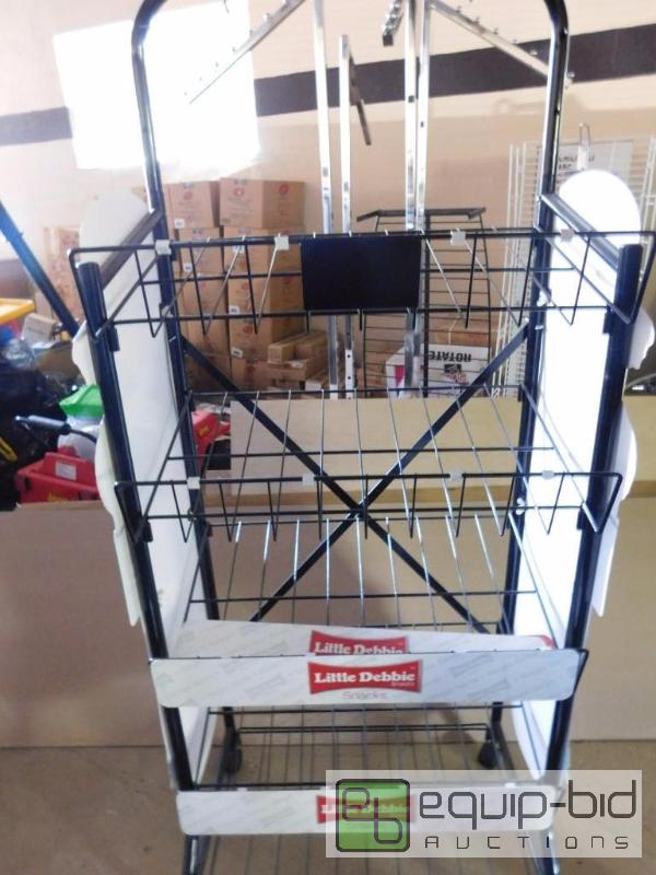lot 295 image: 5 Tier Metal Wire Snack Rack With Castors