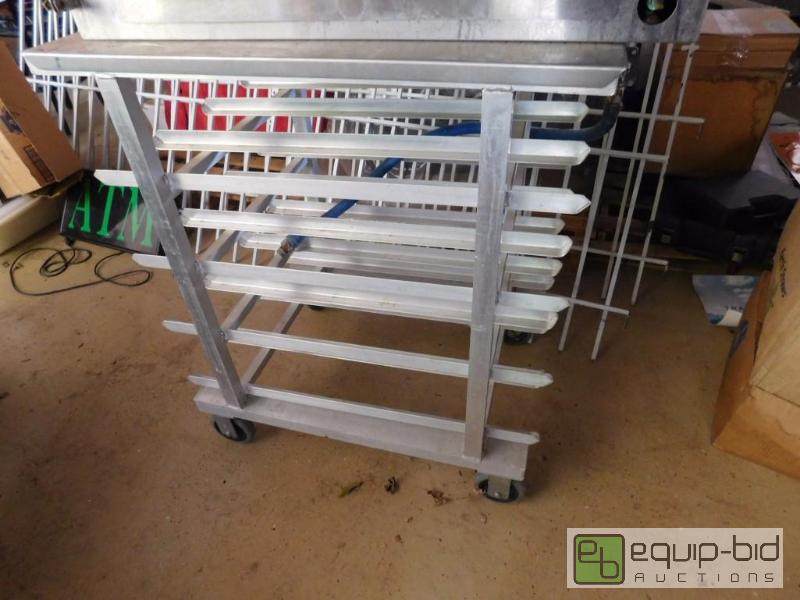 lot 309 image: Aluminum 4 Tier Can Rack On Castors