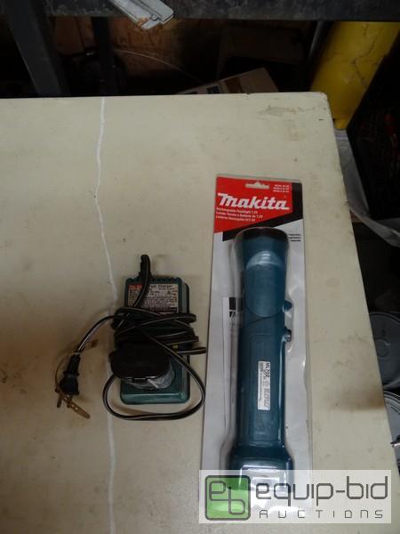 lot 535 image: Makita 7.2V Cordless Light With Battery And Charger