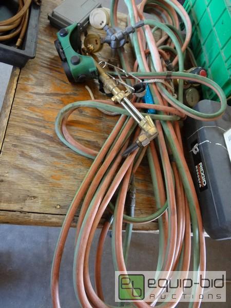 lot 663 image: Cutting Torch Hoses, Torch And Glasses