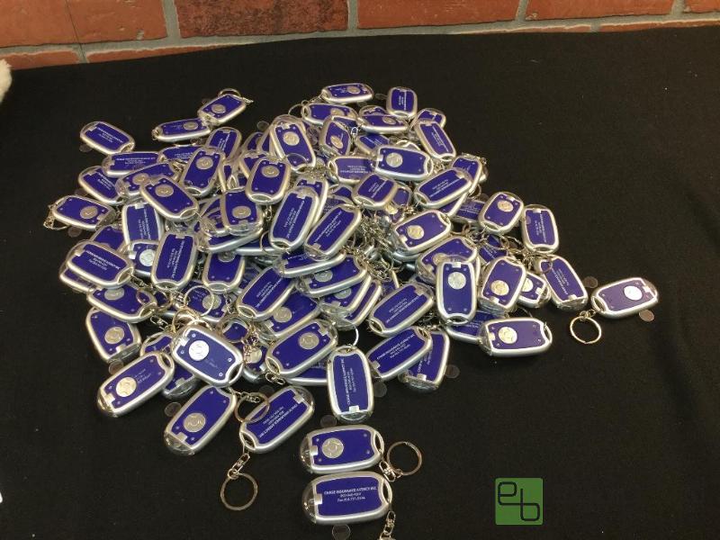 lot 5 image: Press Light Key Chains  Quantity 138 Conditi...