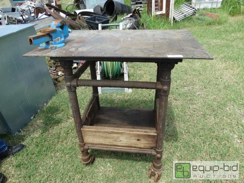 lot 111 image: heavy duty metal Work bench on wheels....