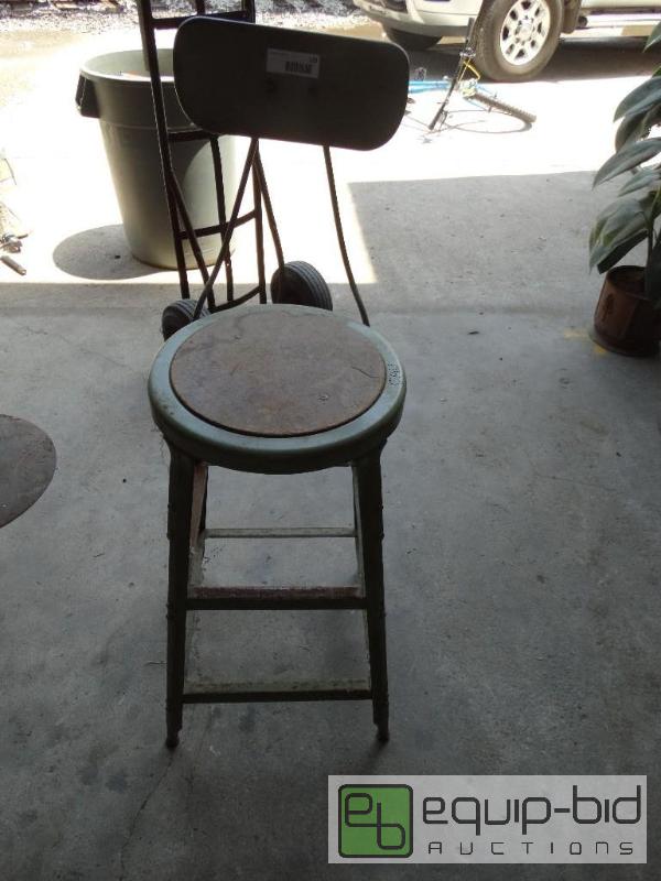 lot 129 image: Vintage shop stool with back rest....