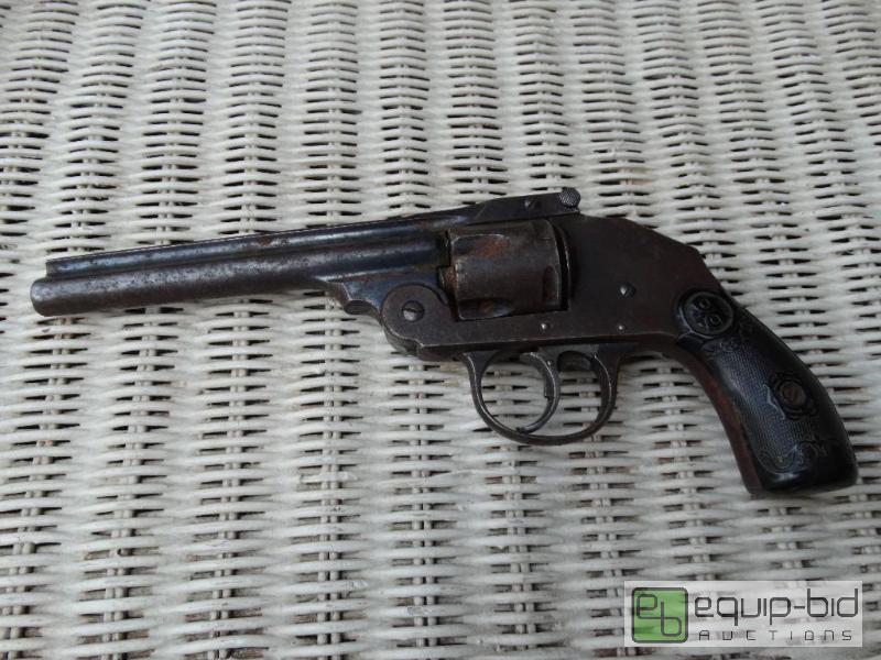 lot 140 image: Revolver, unknown brand.  Wall hanger. 25 cal...