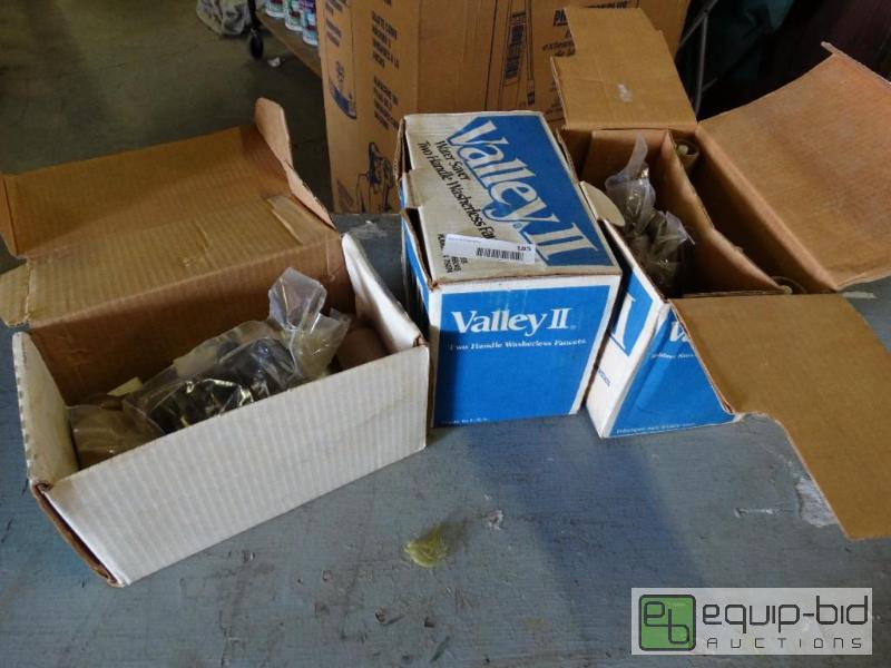 lot 185 image: 3 bathroom faucets in boxes....