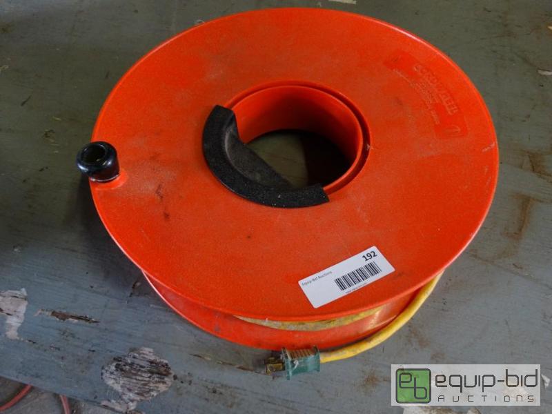 lot 192 image: Extension cord and cord reel....