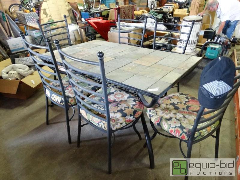 lot 210 image: Slate top dining room table with 6 chairs....