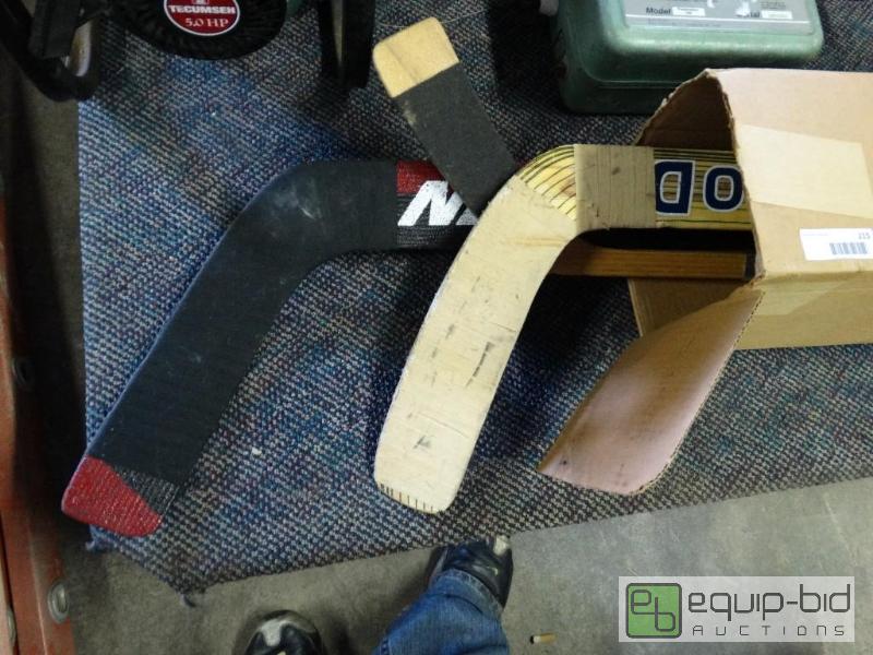 lot 215 image: Lot of 3 hockey sticks....