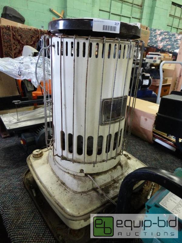 lot 217 image: Kerosene shop heater....
