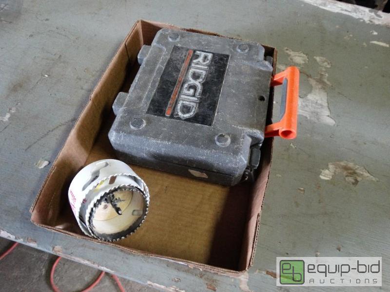 lot 233 image: Ridgid&nbsphole saw set with carry case....
