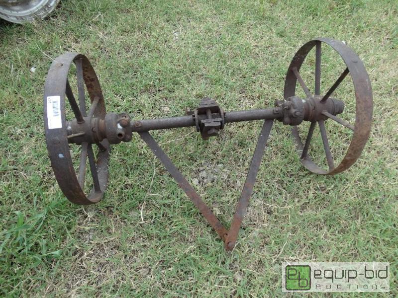 lot 267 image: Old metal implement wheels....