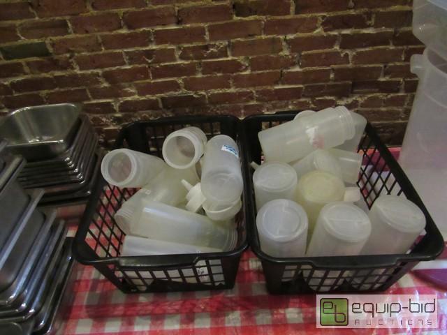 lot 436 image: Lot Of (2) Tubs Of Condiment Bottles