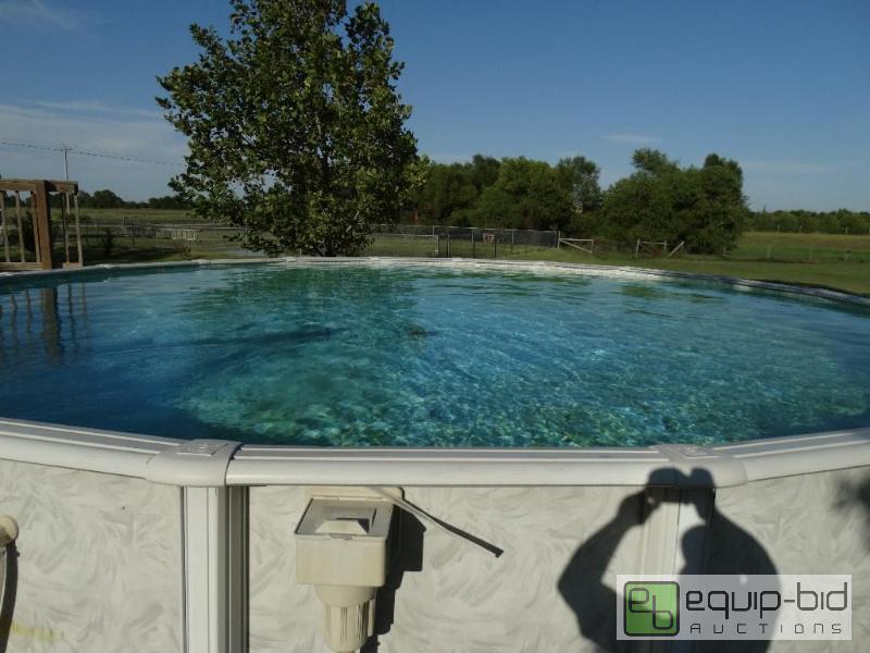 lot 14 image: Large 24 foot round swimming pool and supplie...