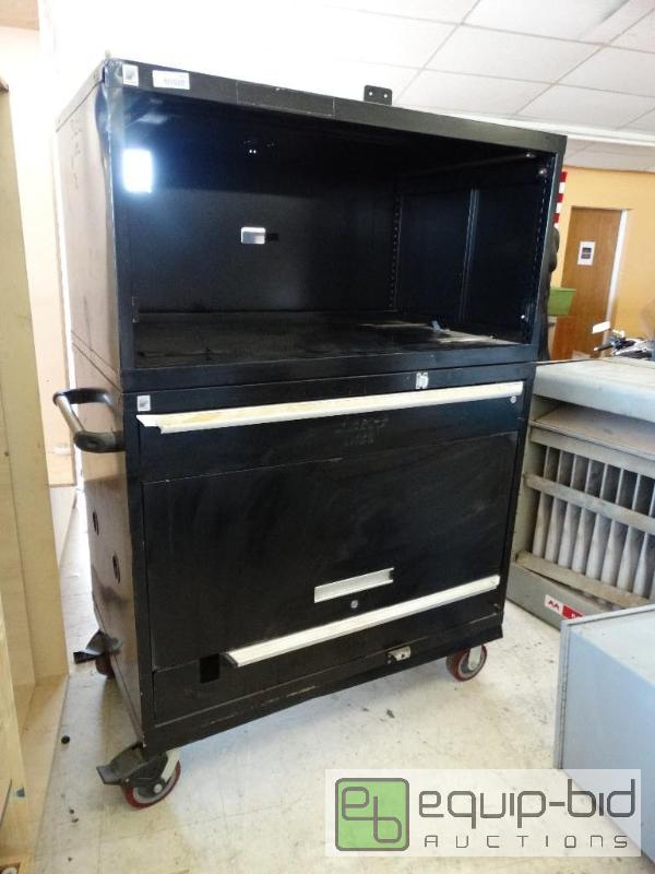 lot 1532 image: Large heavy metal cabinet on wheels....