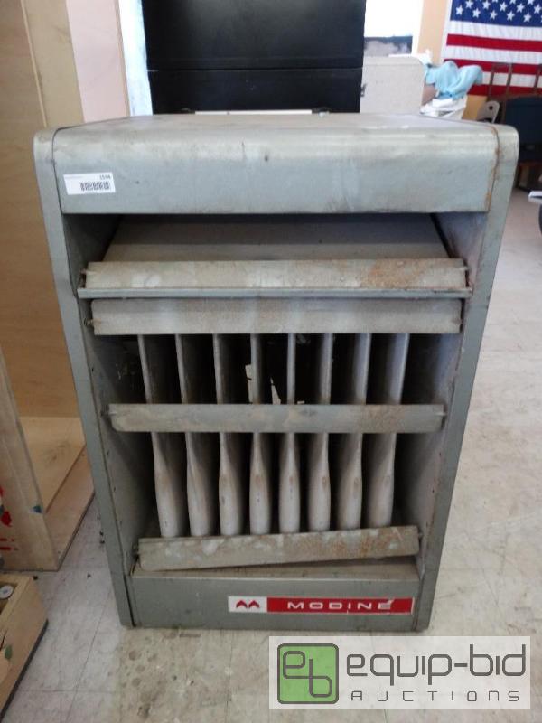 lot 1534 image: Modine hanging gas heater....