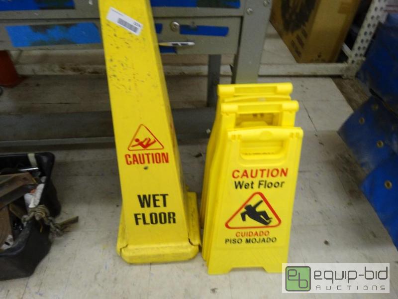 lot 1574 image: 2 wet floor cones and 4 wet floor signs....