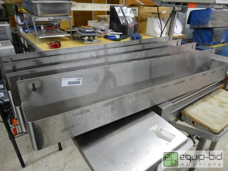 lot 1597 image: Lot of 4 stainless steel speed rails....