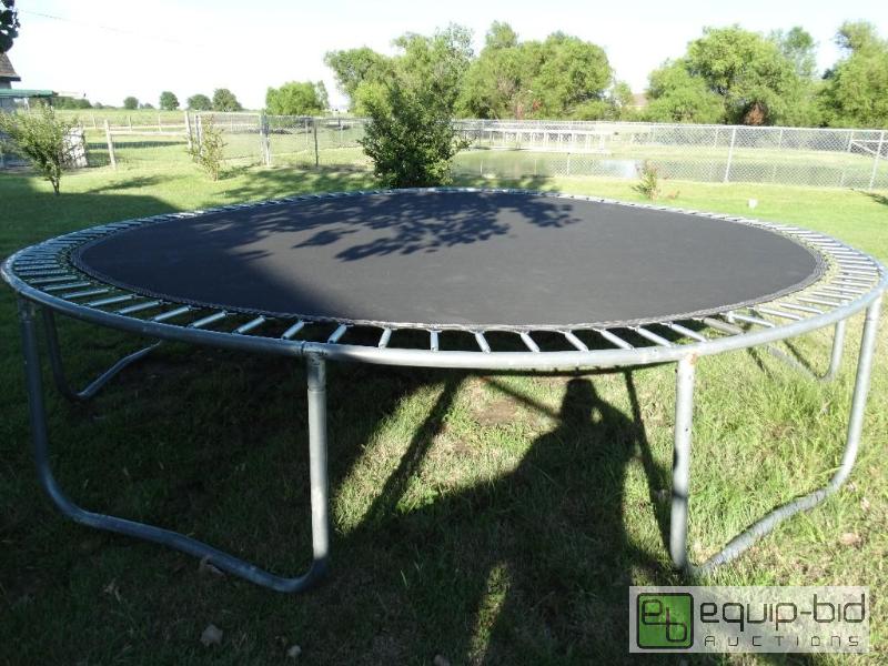 lot 16 image: Large outdoor trampoline.  All springs are th...