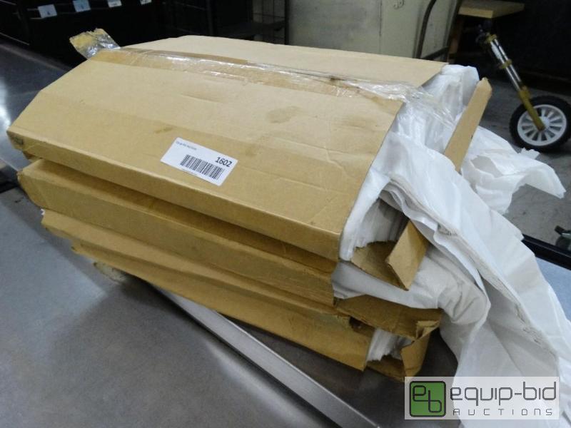 lot 1602 image: 4 boxes of plastic disposable aprons....