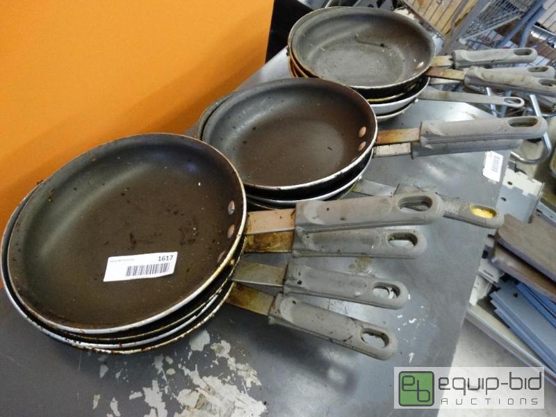 lot 1617 image: Lot of 11 egg skillets....