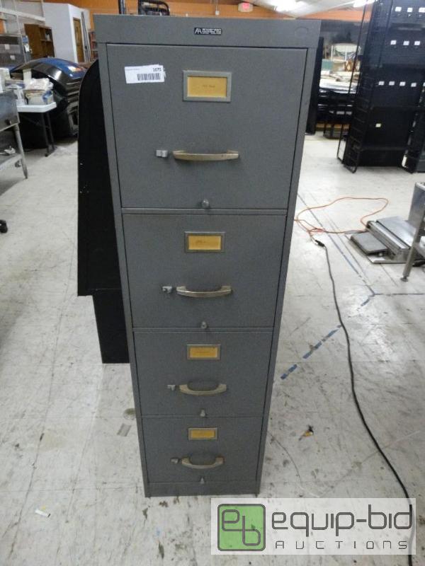 lot 1675 image: 4 Drawer metal cabinet....