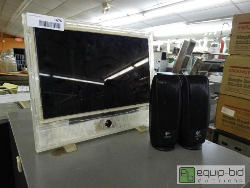 lot 1676 image: Clear 13&quot flat panel t.v. and speakers....