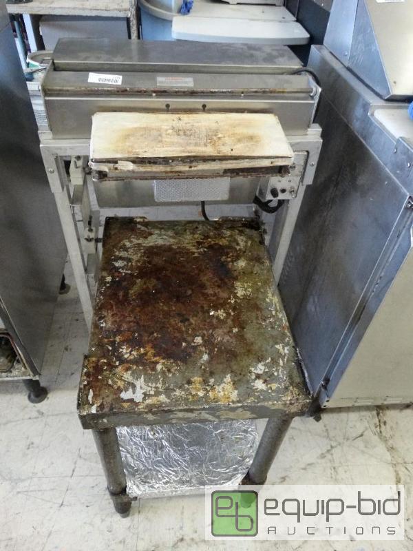 lot 1729 image: Small equipment table and meat wrap....