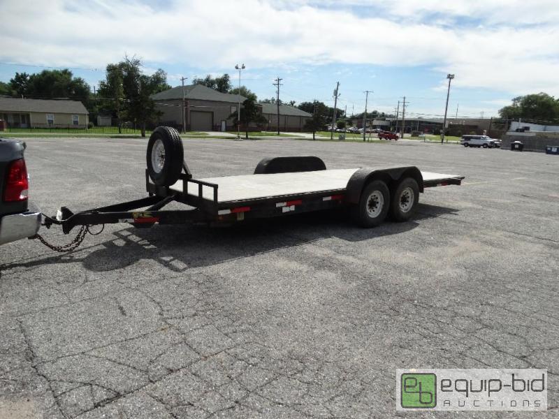 lot 20 image: Heavy duty 20 ft tilt bed equipment trailer. ...