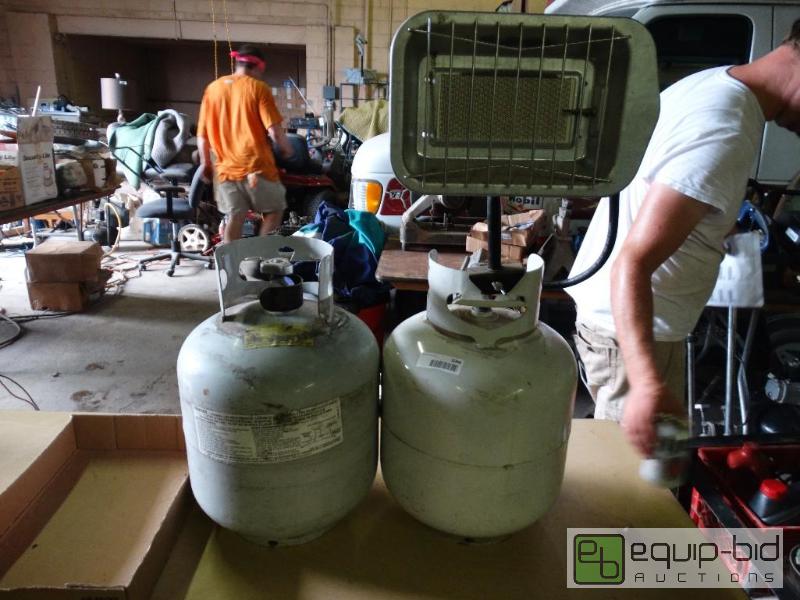 lot 1046 image: Propane heater and two tanks both have propan...