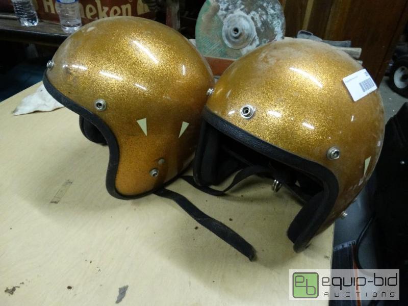 lot 1095 image: 2 Vintage gold helmets....