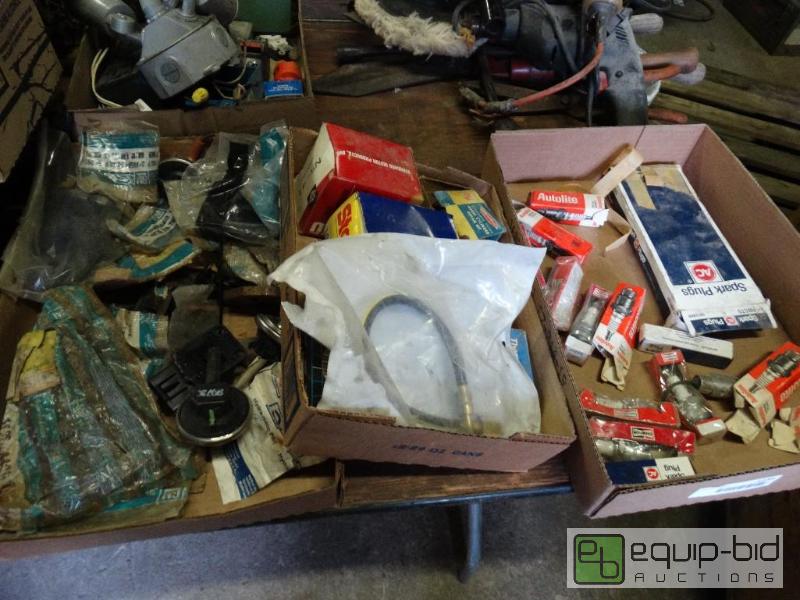 lot 1156 image: 3 Flats, spark plugs and car stuff.&nbsp...