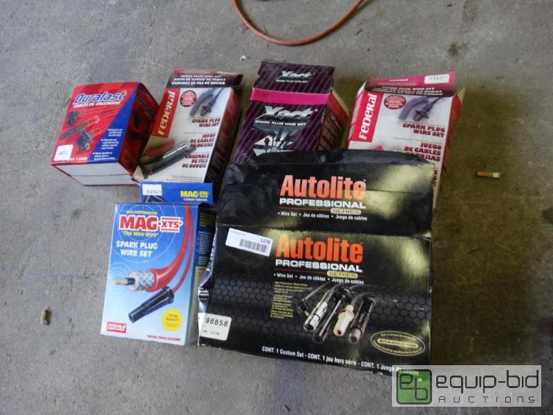 lot 1176 image: 6 boxes spark plug wires....