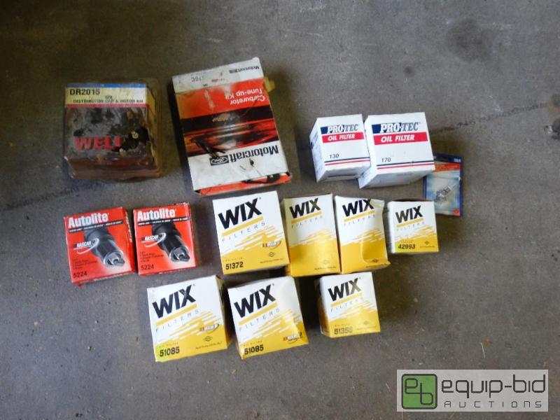 lot 1177 image: Oil filters and spark plug wires....