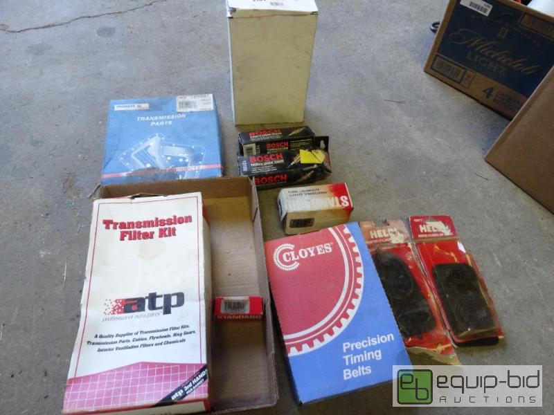 lot 1188 image: Auto parts, transmission and air filter....