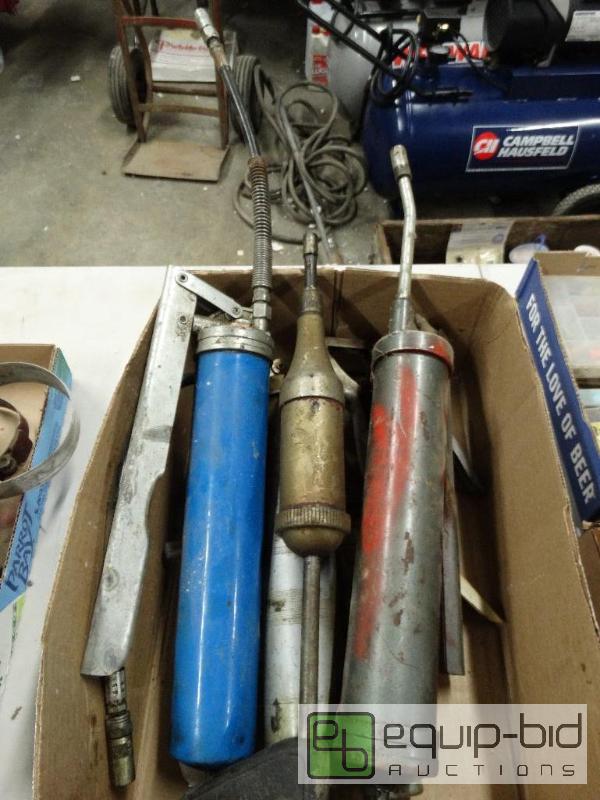 lot 1193 image: grease guns....