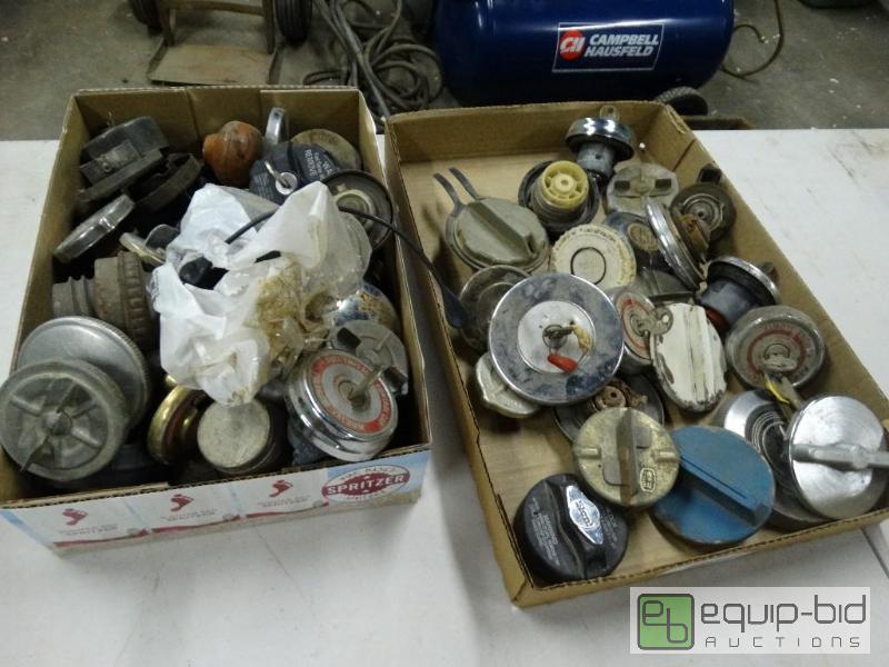 lot 1215 image: Fuel caps....