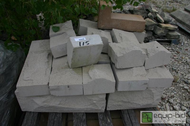 lot 115 image: cut stone with rough finish...